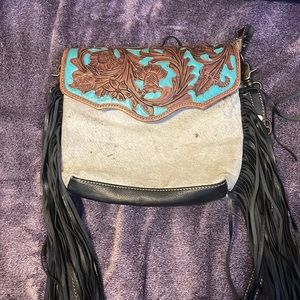 Myra bag made out of hide and leather